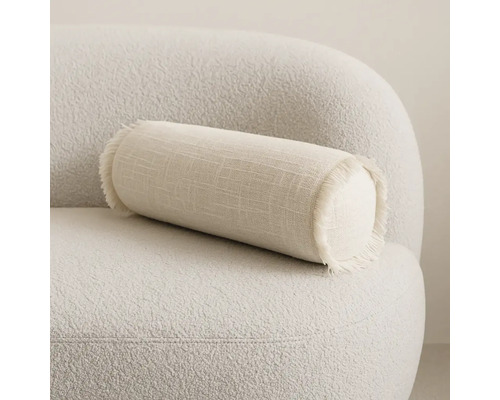 Decoratief kussen in cilindervorm op een fauteuil