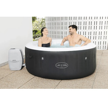 Opblaasbare Lay-Z-Spa Miami whirlpool met twee personen in het water en een bijbehorende pomp.