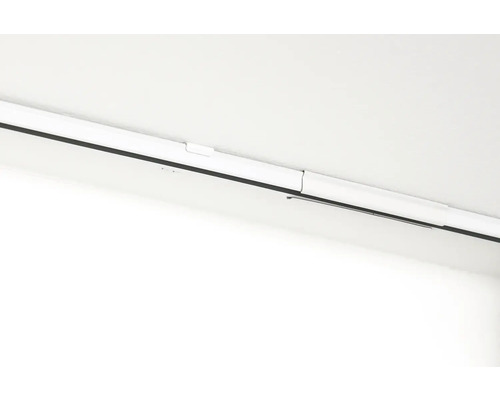 Foto van een gordijnrail aan het plafond