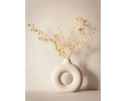 Decoratieve haver takken in een moderne donutvaas