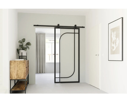 Scene met schuifdeur met glazen inzetstuk en metalen frame, dressoir met decoratie, afbeelding aan de muur
