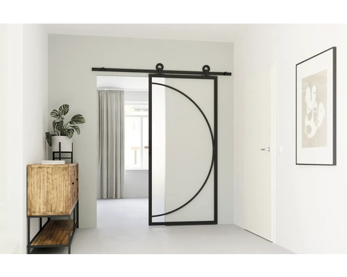 Hal met schuifdeur van glas en zwart metalen frame, commode met plant en ingelijste afbeelding