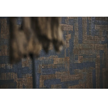 Close-up van een decoratief wandkleed met abstract patroon