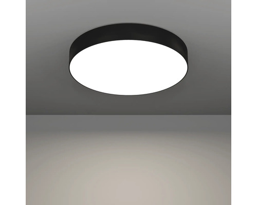 Ronde plafondlamp met eenvoudig ontwerp gemonteerd aan het plafond