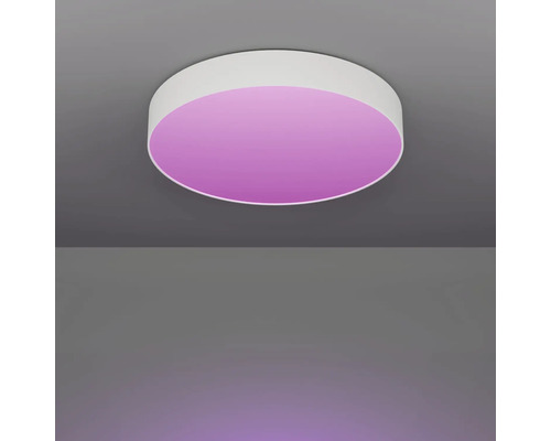 Ronde plafondlamp met gekleurd licht