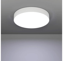 Ronde plafondlamp aan het plafond gemonteerd