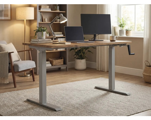 In hoogte verstelbaar bureau met handmatige slinger, laptop en monitor in een lichte kamer.