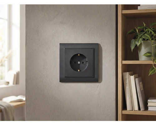 Stopcontact aan de muur gemonteerd