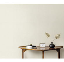 Close-up van een muur met gestructureerd vliesbehang