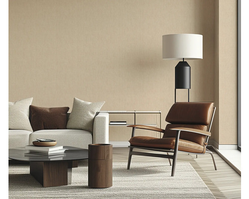 Woonkamer met bank, fauteuil en staande lamp