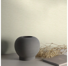 Decoratief behang met een vaas en een boek op een tafel