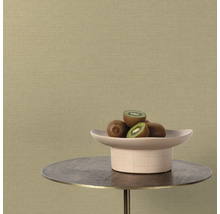 Close-up van een textielbehang met kiwi's op een tafel