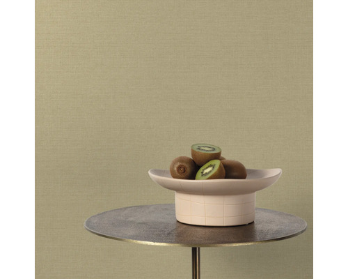 Close-up van een textielbehang met kiwi's op een tafel