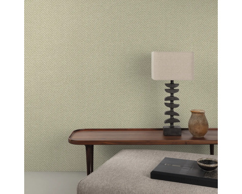 Close-up van een kamer met gestructureerd tapijt en decoratieve elementen