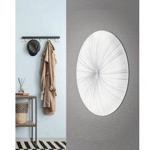 Decoratieve ronde wandlamp in de gang