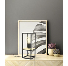 Decoratieve tafellamp met geometrische metalen voet en houten element