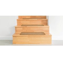 Houten trap met traptredenmatten