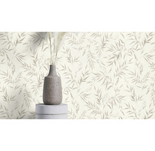 Vliesbehang met bladerpatroon en een vaas