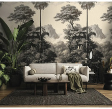 Woonkamer met bank, tafel en fotobehang met jungle motief