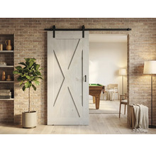 Houten schuifdeur in schuurstijl met beslag voor bakstenen muur