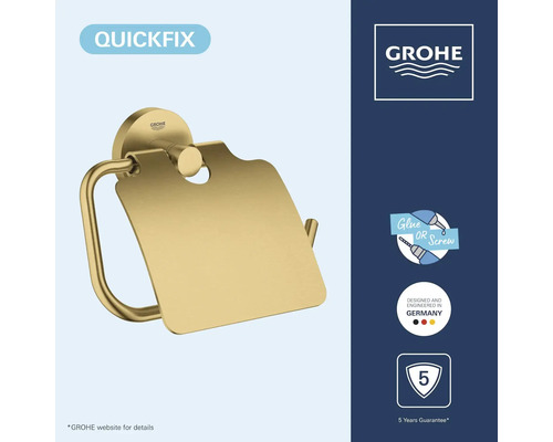 Goudkleurige Grohe toiletrolhouder met klep, QuickFix systeem om te plakken of te schroeven, 5 jaar garantie, Grohe Logo.