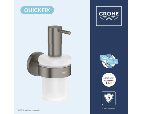 Grohe wandzeepdispenser van glas en donker metaal, QuickFix voor lijmen of schroeven, 5 jaar garantie, in Duitsland ontworpen, Grohe Logo.