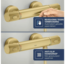 Grohe Logo op gouden thermostaat douchemengkraan met beveiliging tegen verbranding bij 38 graden en antislip handgrepen met textuur.