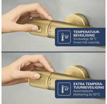 Goudkleurige thermostaatkraan met temperatuurbeveiliging op 38 graden en automatische blokkering op 43 graden.