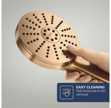 Grohe handdouche met onderhoudsvriendelijke siliconen sproeigaatjes voor eenvoudige kalkverwijdering door afvegen.