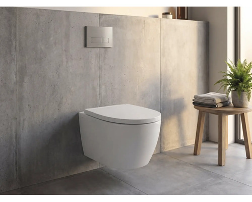 Hangend toilet in een moderne badkamer met betonlook, bedieningspaneel aan de muur en een houten krukje met handdoeken en een plant.