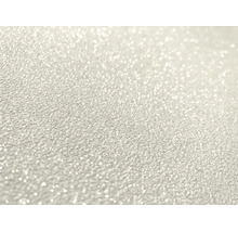 Getextureerd oppervlak met fonkelende glitterdeeltjes.