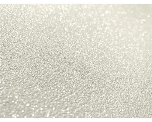 Getextureerd oppervlak met fonkelende glitterdeeltjes.