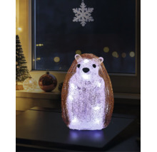 LED-decoratiefiguur egel van acryl met een kristalachtig oppervlak, staand op een tafel in een feestelijk gedecoreerde kamer met kerstversiering.