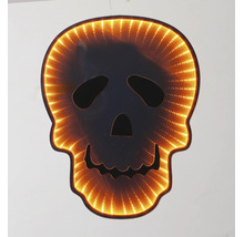 Verlichte Halloween-decoratie schedel met infinity-spiegeleffect en warm licht.