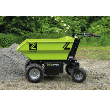 Zipper elektrische dumper met grote bak en vier wielen op grind naast een stapel stenen.