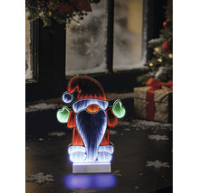 LED-kerstkabouter met infinity-spiegeleffect op een tafel voor een winters raam met kerstboom en cadeau.