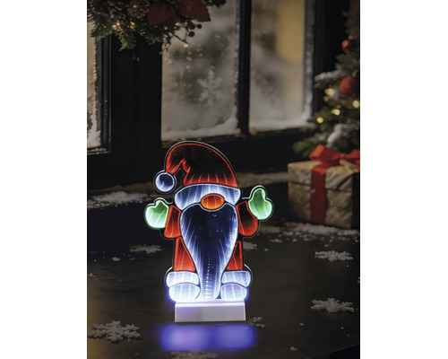 LED-kerstkabouter met infinity-spiegeleffect op een tafel voor een winters raam met kerstboom en cadeau.