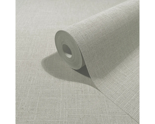 Grijs vliesbehang met textielstructuur in linnenlook, op rol en platliggend.