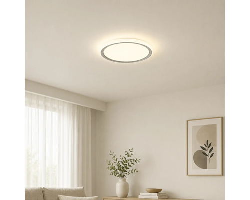 Ronde LED-plafondlamp in een lichte, modern ingerichte woonkamer met een minimalistisch design.
