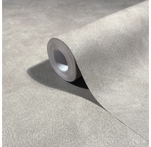 Gestructureerd vliesbehang op rol met een fijne pleisterlook.