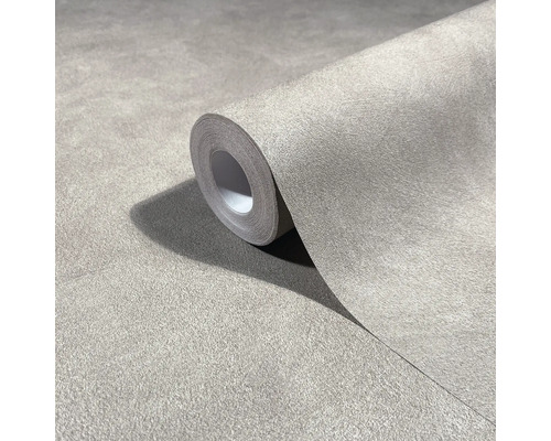 Gestructureerd vliesbehang op rol met een fijne pleisterlook.