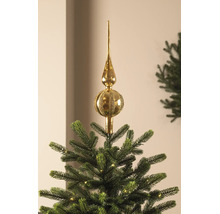 Gouden kerstboompiek van glas met glanzende en glitterende strepen op een kerstboom.