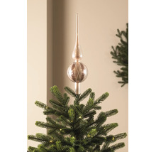 Glazen kerstboompiek met glitterdecoratie op de top van een kunstkerstboom.
