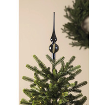 Glazen kerstboomtop met gouden glitters op een verlichte kerstboom.