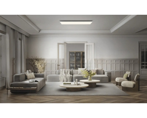 Rechthoekig LED-plafondpaneel in een moderne, ruime woonkamer met zitgroep en wandpanelen.