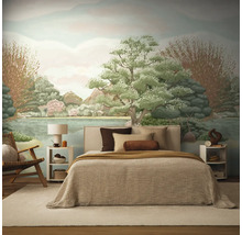 Slaapkamer met groot landschapsbehang met bomen en een meer, voor een tweepersoonsbed in natuurtinten.