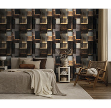 Vliesbehang met 3D-effect in hout- en steenlook in een modern ingerichte slaapkamer met bed en fauteuil.