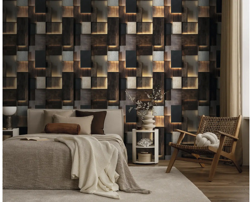 Vliesbehang met 3D-effect in hout- en steenlook in een modern ingerichte slaapkamer met bed en fauteuil.