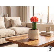 Geënte cactus in geribbelde keramische pot op een houten salontafel in een lichte woonkamer met bank. (Image AI modified or generated)