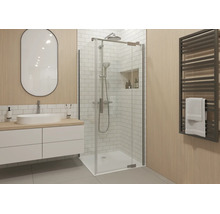 Moderne badkamer met een glazen douchecabine, een wit wastafelmeubel met ovale spiegel en een handdoekradiator tegen een wand met houtlook.